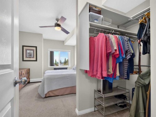 201-72 Quigley Drive, Cochrane, AB - Indoor With Storage