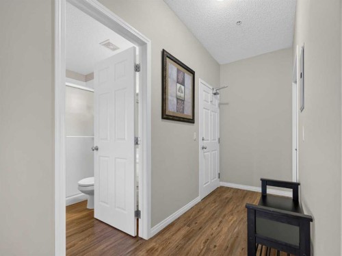 201-72 Quigley Drive, Cochrane, AB - Indoor Photo Showing Other Room