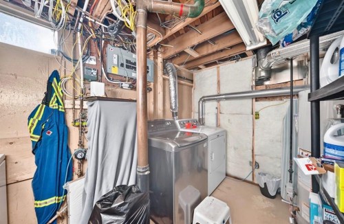 411 Woodland Crescent Se, Calgary, AB - Indoor Photo Showing Laundry Room