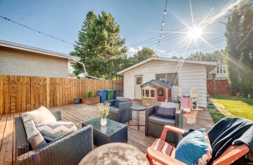 411 Woodland Crescent Se, Calgary, AB - Outdoor With Deck Patio Veranda With Exterior