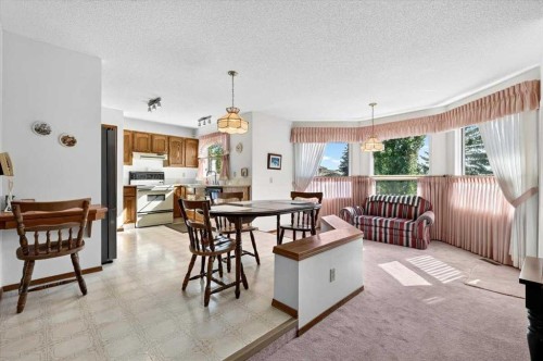 105 Christie Knoll Heights Sw, Calgary, AB - Indoor Photo Showing Dining Room