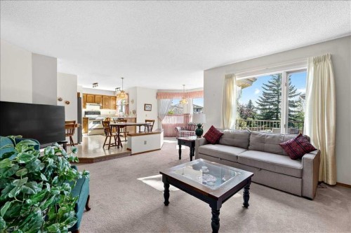 105 Christie Knoll Heights Sw, Calgary, AB - Indoor Photo Showing Living Room