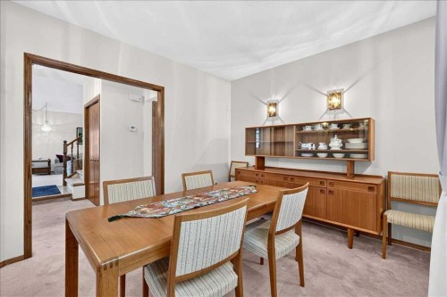 105 Christie Knoll Heights Sw, Calgary, AB - Indoor Photo Showing Dining Room