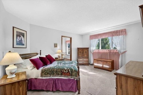 105 Christie Knoll Heights Sw, Calgary, AB - Indoor Photo Showing Bedroom