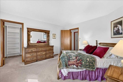 105 Christie Knoll Heights Sw, Calgary, AB - Indoor Photo Showing Bedroom