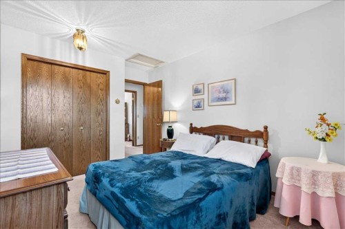 105 Christie Knoll Heights Sw, Calgary, AB - Indoor Photo Showing Bedroom