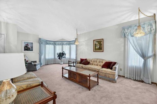 105 Christie Knoll Heights Sw, Calgary, AB - Indoor Photo Showing Living Room