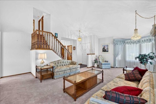 105 Christie Knoll Heights Sw, Calgary, AB - Indoor Photo Showing Living Room
