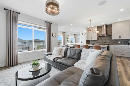 411 Rivercrest Boulevard, Cochrane, AB - Indoor Photo Showing Living Room