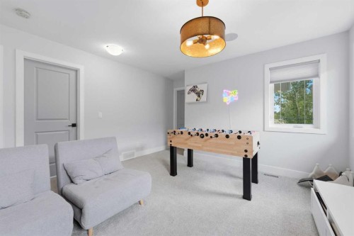 411 Rivercrest Boulevard, Cochrane, AB - Indoor Photo Showing Other Room