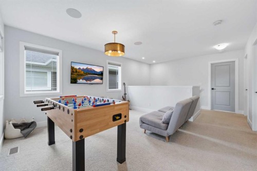 411 Rivercrest Boulevard, Cochrane, AB - Indoor Photo Showing Other Room