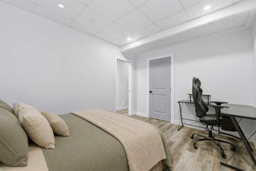 411 Rivercrest Boulevard, Cochrane, AB - Indoor Photo Showing Bedroom