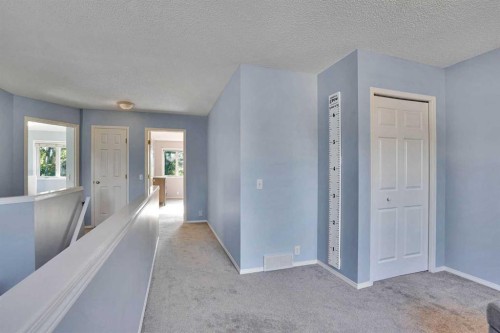 11 Mckenzie Lake View Se, Calgary, AB - Indoor Photo Showing Other Room