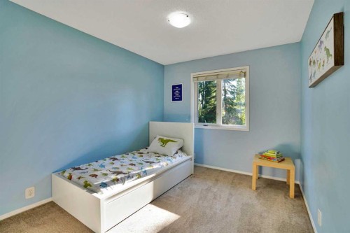 11 Mckenzie Lake View Se, Calgary, AB - Indoor Photo Showing Bedroom