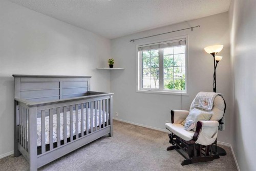 11 Mckenzie Lake View Se, Calgary, AB - Indoor Photo Showing Bedroom