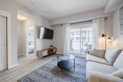 315-100 Auburn Meadows Manor Se, Calgary, AB - Indoor Photo Showing Living Room