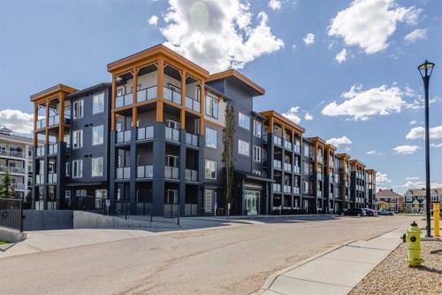 315-100 Auburn Meadows Manor Se, Calgary, AB - Outdoor With Balcony With Facade