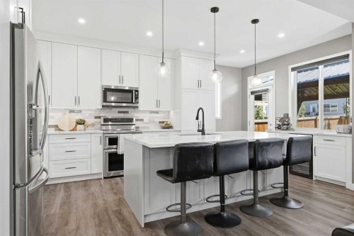 379 Cimarron Boulevard, Okotoks, AB - Indoor Photo Showing Kitchen With Upgraded Kitchen