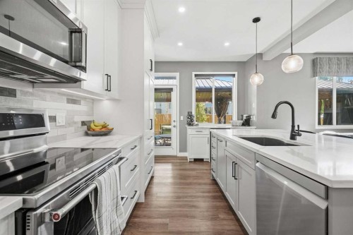 379 Cimarron Boulevard, Okotoks, AB - Indoor Photo Showing Kitchen With Upgraded Kitchen