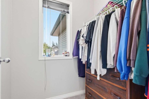 379 Cimarron Boulevard, Okotoks, AB - Indoor With Storage