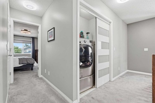 379 Cimarron Boulevard, Okotoks, AB - Indoor Photo Showing Laundry Room