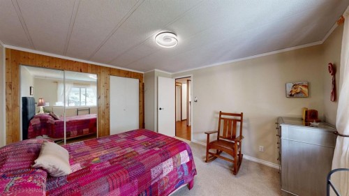 304 Slade Drive, Nanton, AB - Indoor Photo Showing Bedroom