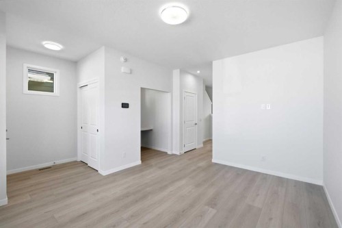 131 Royston Way Nw, Calgary, AB - Indoor Photo Showing Other Room