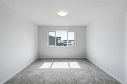 131 Royston Way Nw, Calgary, AB - Indoor Photo Showing Other Room