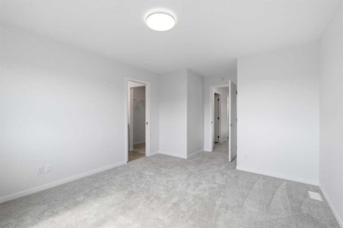 131 Royston Way Nw, Calgary, AB - Indoor Photo Showing Other Room