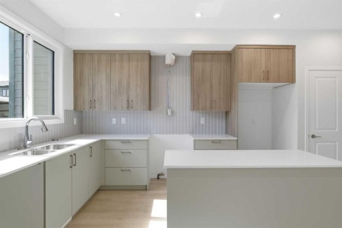 131 Royston Way Nw, Calgary, AB - Indoor Photo Showing Kitchen With Double Sink
