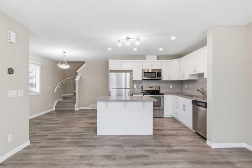 1449 Carrington Boulevard Nw, Calgary, AB - Indoor Photo Showing Kitchen With Stainless Steel Kitchen