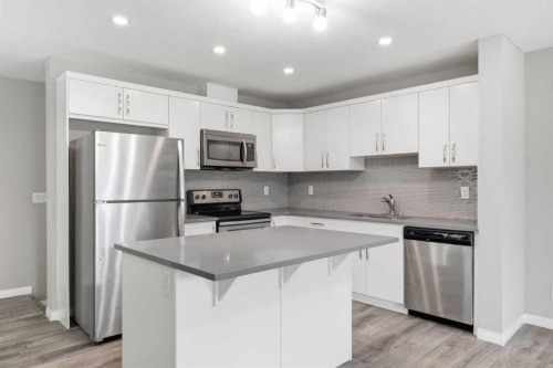 1449 Carrington Boulevard Nw, Calgary, AB - Indoor Photo Showing Kitchen With Stainless Steel Kitchen With Upgraded Kitchen