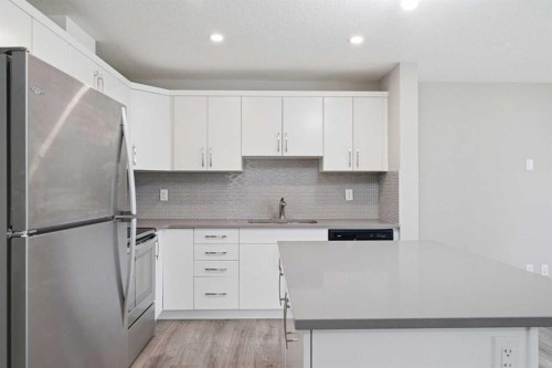 1449 Carrington Boulevard Nw, Calgary, AB - Indoor Photo Showing Kitchen With Upgraded Kitchen