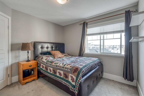 177 Cougartown Circle Sw, Calgary, AB - Indoor Photo Showing Bedroom