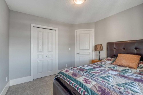 177 Cougartown Circle Sw, Calgary, AB - Indoor Photo Showing Bedroom