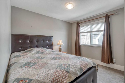 177 Cougartown Circle Sw, Calgary, AB - Indoor Photo Showing Bedroom