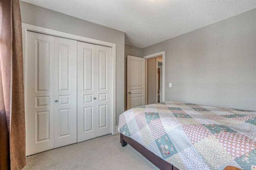 177 Cougartown Circle Sw, Calgary, AB - Indoor Photo Showing Bedroom