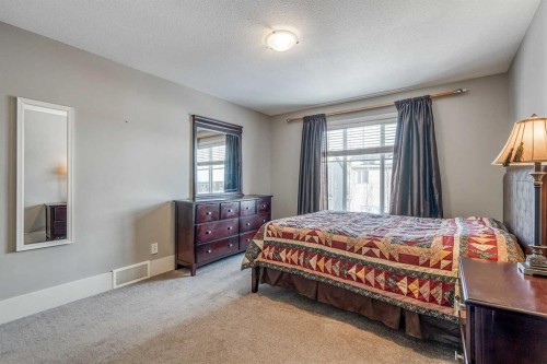 177 Cougartown Circle Sw, Calgary, AB - Indoor Photo Showing Bedroom