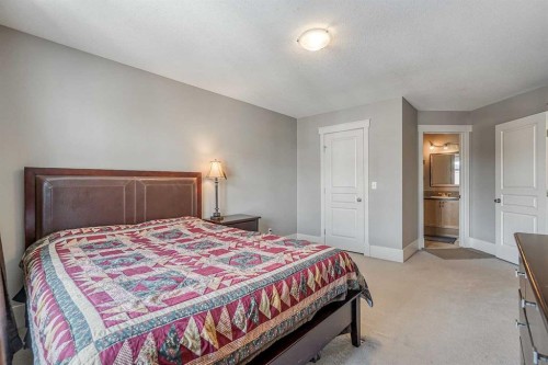177 Cougartown Circle Sw, Calgary, AB - Indoor Photo Showing Bedroom