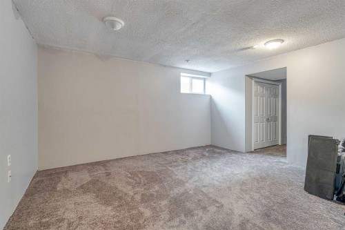 177 Cougartown Circle Sw, Calgary, AB - Indoor Photo Showing Other Room
