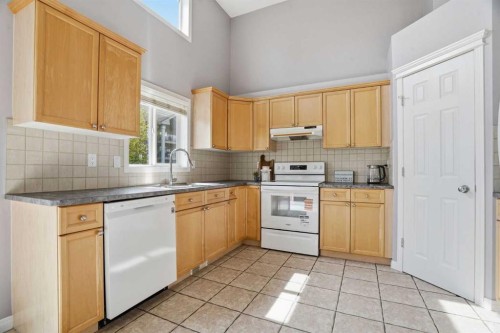 62 Country Hills Cove Nw, Calgary, AB - Indoor Photo Showing Kitchen