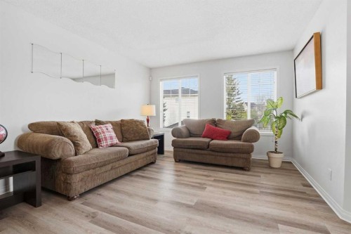 62 Country Hills Cove Nw, Calgary, AB - Indoor Photo Showing Living Room