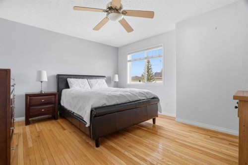 62 Country Hills Cove Nw, Calgary, AB - Indoor Photo Showing Bedroom