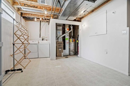 62 Country Hills Cove Nw, Calgary, AB - Indoor Photo Showing Laundry Room