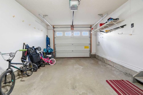 62 Country Hills Cove Nw, Calgary, AB - Indoor Photo Showing Garage