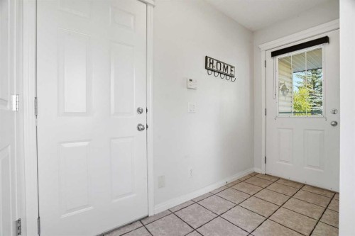 62 Country Hills Cove Nw, Calgary, AB - Indoor Photo Showing Other Room