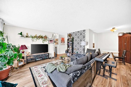 407-903 19 Avenue Sw, Calgary, AB - Indoor Photo Showing Living Room