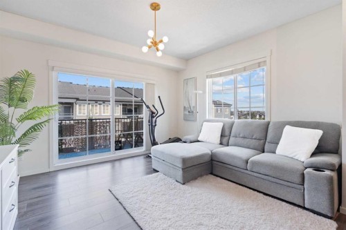 3417-215 Legacy Boulevard Se, Calgary, AB - Indoor Photo Showing Living Room