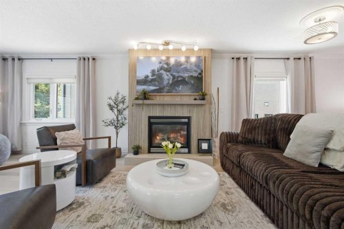 1835 29 Avenue Sw, Calgary, AB - Indoor Photo Showing Living Room With Fireplace