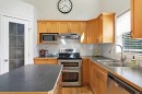 277 Inglewood Grove Se, Calgary, AB  - Indoor Photo Showing Kitchen With Double Sink 
